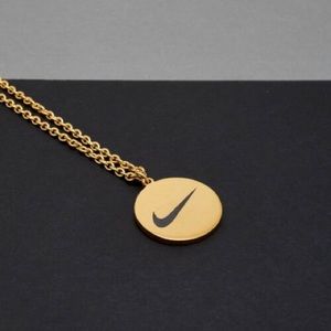 brand new nike gold necklace!